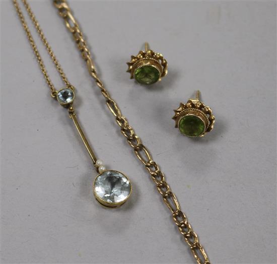 A 15ct gold and aquamarine drop pendant, a 9ct chain and a pair of 9ct gem set earrings.